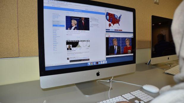A computer screen with the U.S. presidential candidates on Twitter and Youtube